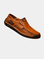 Close-up of light brown leather slip-on loafer with hand-stitched welt – TARLANO