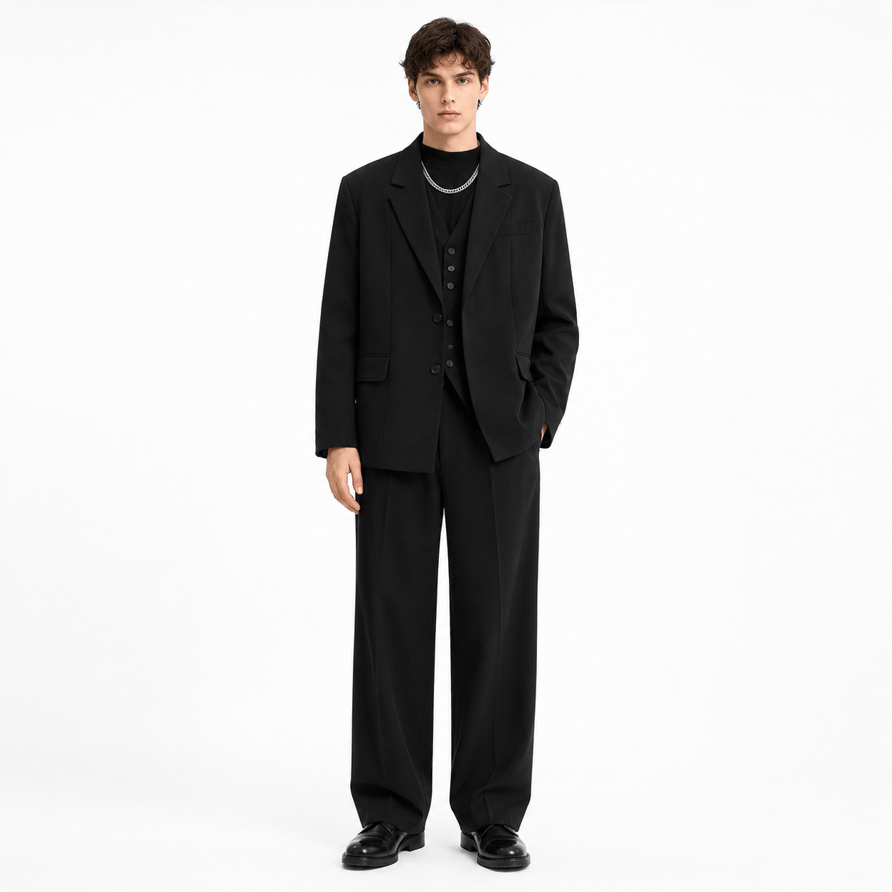 Model wearing three-piece notch lapel suit with vest in black – TARLANO