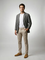 Model wearing linen two-button blazer in gray – TARLANO