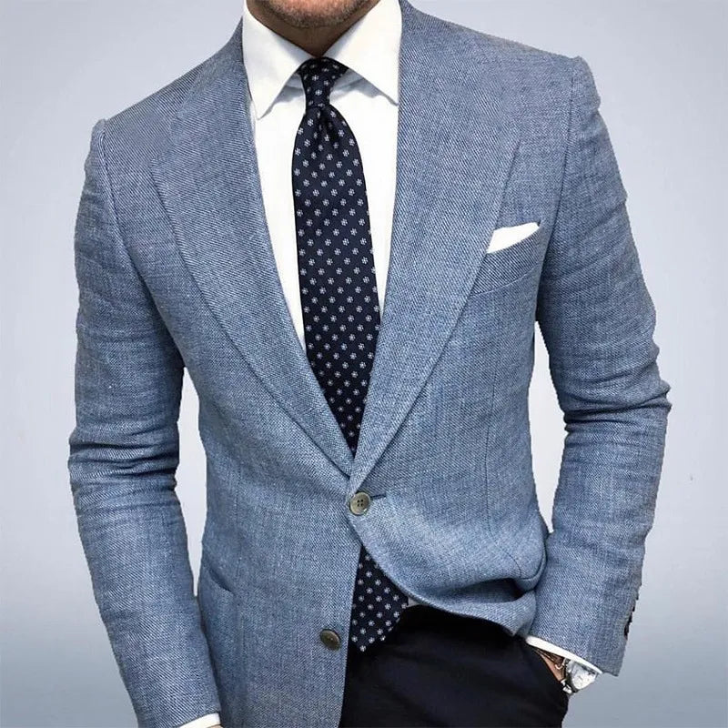 Model wearing tailored blazer in light gray – TARLANO