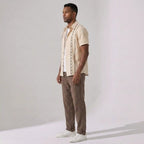 Model wearing beige geometric print shirt and cropped linen blend pants set – TARLANO