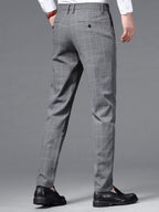 Model wearing grey plaid stretch dress trouser – TARLANO