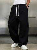 Wide leg drawstring sweatpant in black – TARLANO