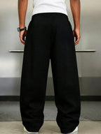 Model wearing wide leg relaxed fit sweatpant in black – TARLANO