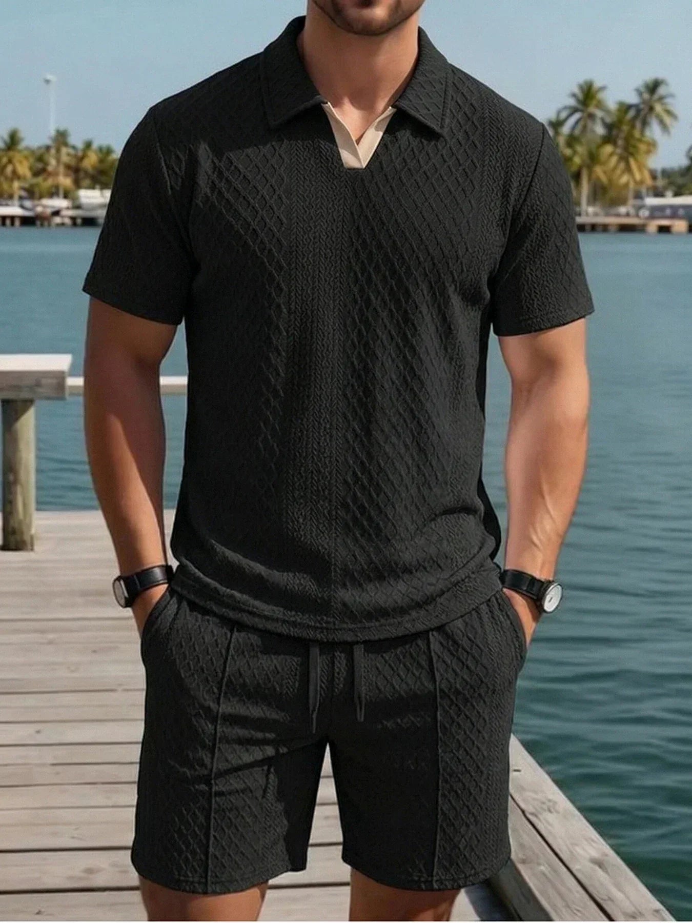 Model wearing knit polo short set in black – TARLANO