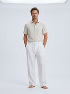 Relaxed drawstring beach pants — On Model - Neutral | Generated by Modelize